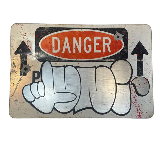 Metal sign with 'DANGER' warning label and cartoonish design on a white background