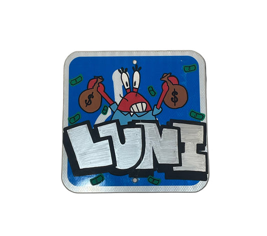 Sticker with cartoon character and 'LUNI' text on a blue background